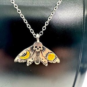 Moth skull necklace​‎ 🦕